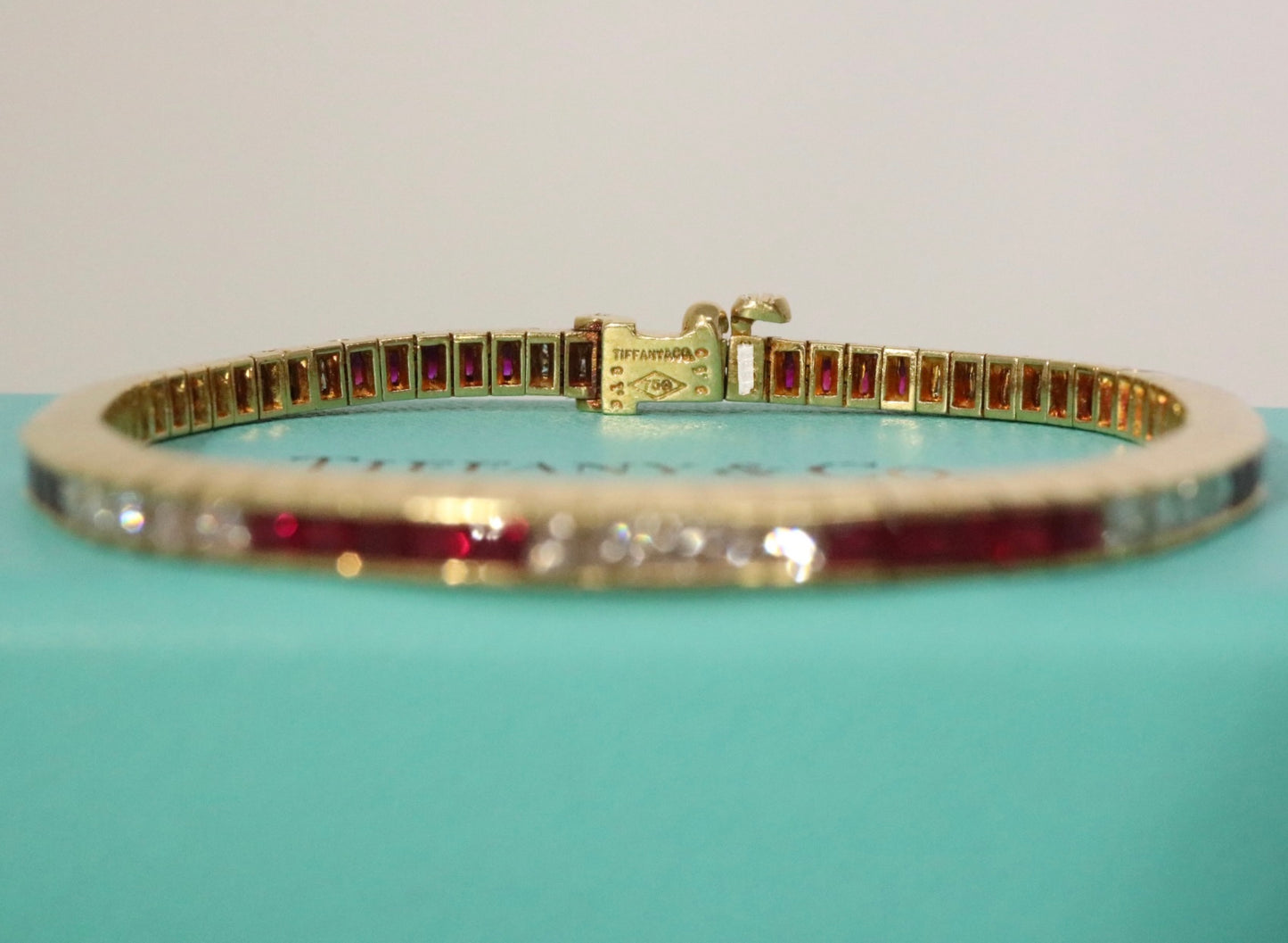 Tiffany & Co 6.78CTW Ruby and Princess Cut Diamond Line Tennis Bracelet