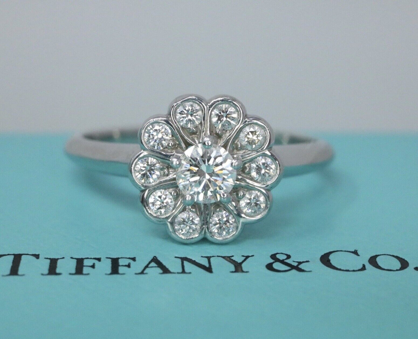 Tiffany & Co Platinum Round Diamond Flower Ring VVS1/G .25ctw