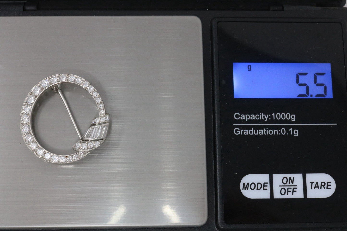 Tiffany & Co. Circle Platinum Baguette & Round Diamond Pin Brooch*